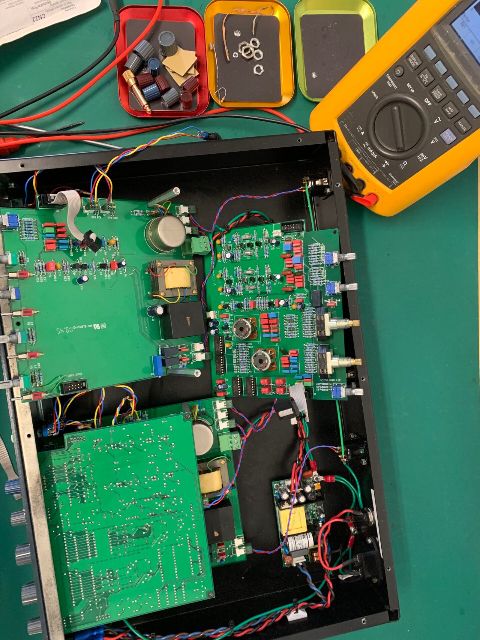 Technician examining equipment
