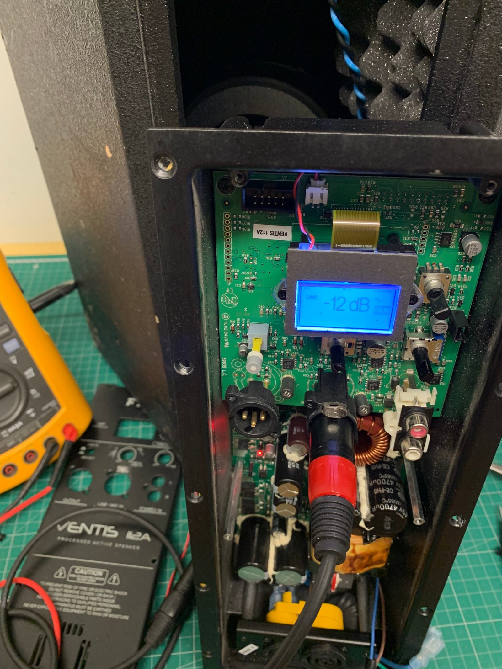 Technician examining equipment